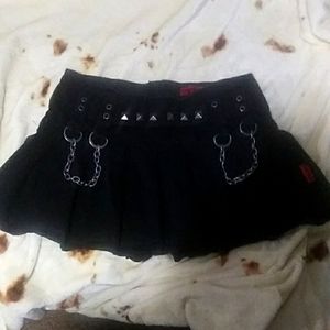 Black pleated Tripp mini-skirt with studs and chains (M)